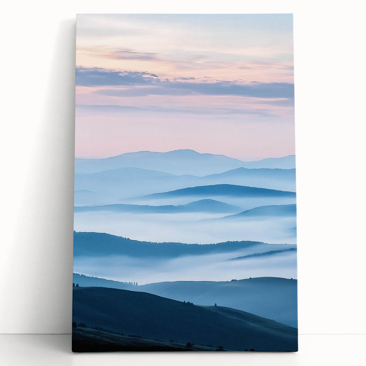 Stretched canvas artwork showcasing a serene countryside landscape with rolling hills, soft green fields, and a peaceful sky, perfect for home decor.