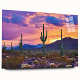 Desert landscape acrylic artwork displayed in a clear glass frame, showcasing warm earthy tones and intricate details, perfect for modern home decor.