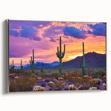 Framed canvas artwork showcasing a vibrant desert landscape with rich colors, elegantly displayed from a side view, featuring a sleek silver frame for a modern touch.
