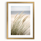 Extra large abstract art print featuring textured swirls in warm orange and gold tones on a framed canvas.