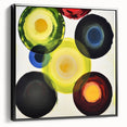 Framed abstract geometric canvas artwork showcasing a bold black design, ideal for modern home decor, displayed in a stylish side view to highlight its depth and elegance.
