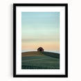 Black-framed landscape artwork showcasing a serene countryside scene, complete with a white mat for added elegance, ideal for home decor and art enthusiasts.