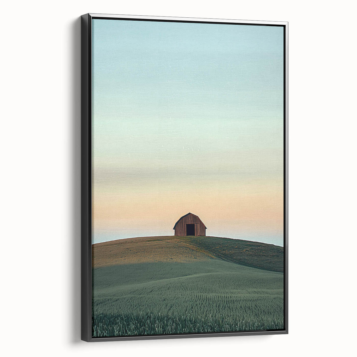Framed canvas print of a serene countryside landscape showcasing lush green fields, rolling hills, and a vibrant sky with soft clouds, presented in a sleek black frame. Perfect for home decor enthusiasts seeking nature-inspired art.