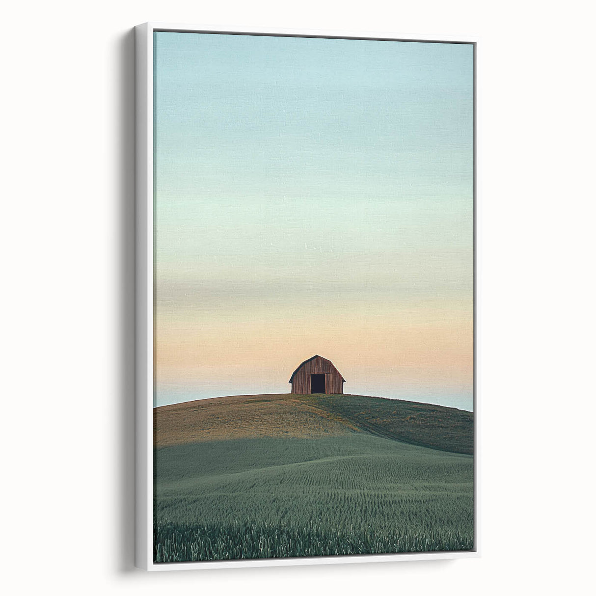 Framed canvas artwork depicting a serene countryside landscape with lush green fields and soft blue skies, presented in a sleek white frame for elegant home decor.