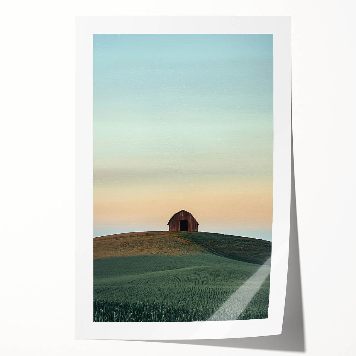 Vibrant rolled print showcasing a picturesque countryside landscape, featuring lush green fields and a clear blue sky, elegantly packaged in a protective cardboard tube for safe storage.