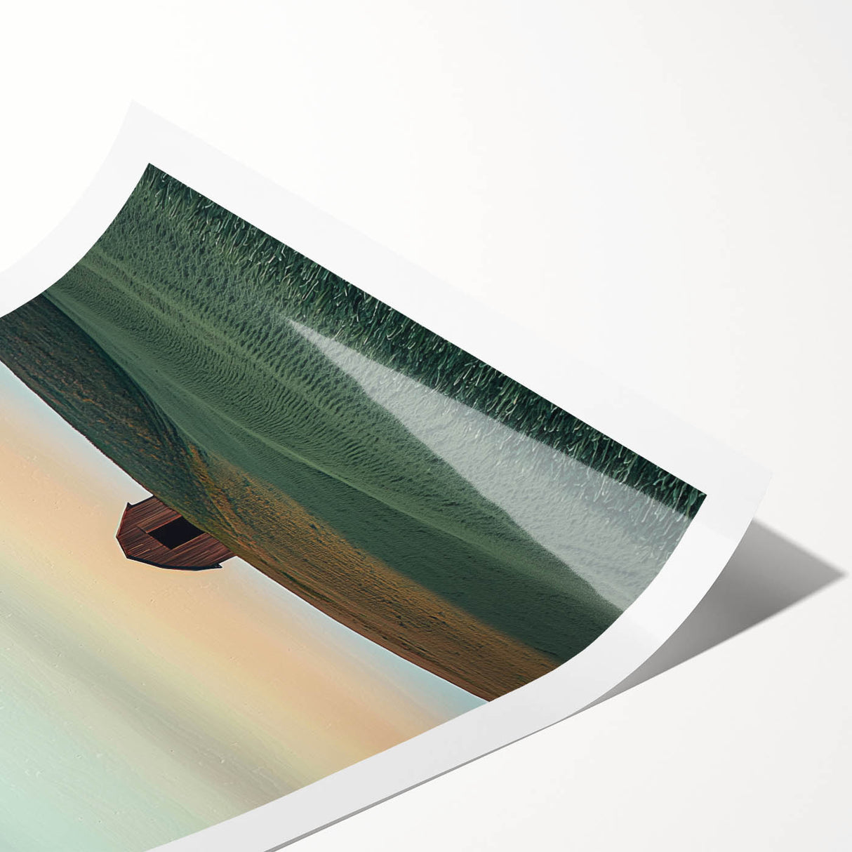Rolled landscape print showcasing a serene countryside scene with vibrant green fields and a clear blue sky, elegantly packaged in a protective cardboard tube. Ideal for home decor.