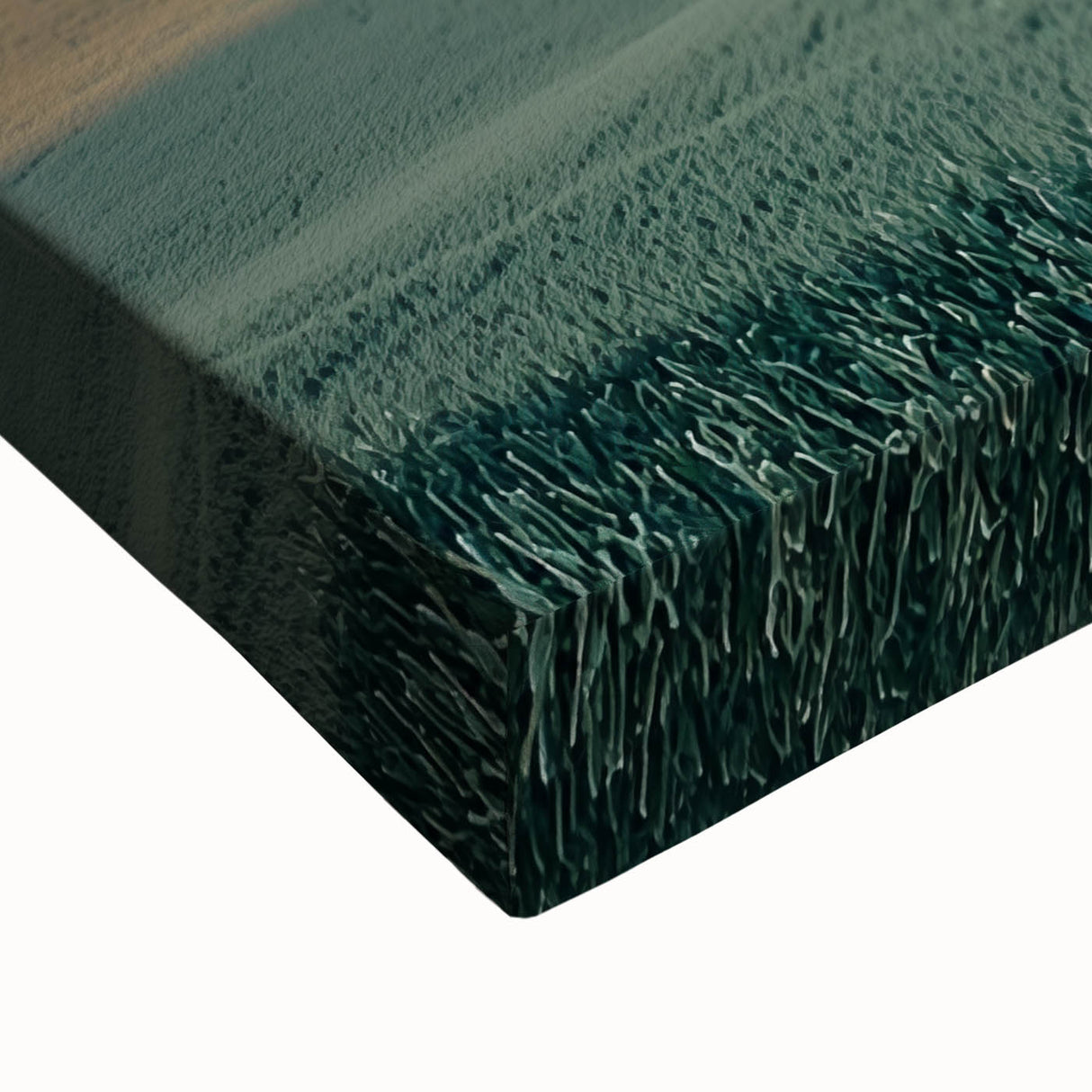 Close-up of a stretched canvas artwork depicting a serene countryside landscape with vibrant green fields, a clear blue sky, and distant hills, ideal for home decor.