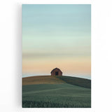 Stretched canvas artwork showcasing a serene countryside landscape with lush green hills and a vibrant blue sky, perfect for home decor.