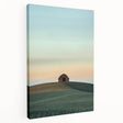 Stretched canvas artwork showcasing a serene countryside landscape with lush green fields and a clear blue sky, perfect for home decor and nature lovers.