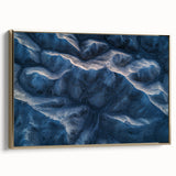 Framed canvas artwork showcasing a desert landscape with golden hues, elegantly displayed from the side, ideal for home décor and art enthusiasts.