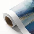 Abstract wall art featuring colorful strokes in shades of blue, orange, and yellow on rolled canvas, ideal for modern home decor and artistic interior design.