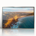 Framed acrylic art piece showcasing a stunning landscape of dramatic cliffs, featuring silver accents and a sleek modern design, perfect for home decor.