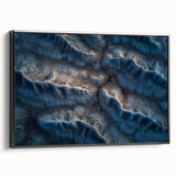 Framed canvas artwork depicting a vibrant desert landscape in warm tones, showcasing a black frame and side view, perfect for modern home decor.