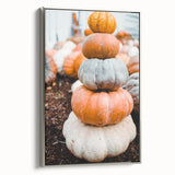 Framed canvas depicting a fall landscape with trees in vibrant autumn colors, ideal for living room decor.