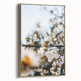 Framed canvas depicting a vintage-style landscape with spring theme in muted green and gold tones.