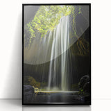 Framed acrylic artwork showcasing a vibrant landscape scene with caves, presented in a sleek black frame, ideal for modern home decor and art enthusiasts.