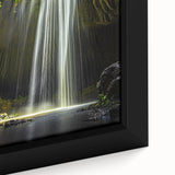 Close-up view of a framed canvas artwork depicting abstract landscape and cave designs, showcasing vibrant colors and intricate details, perfect for modern home decor.