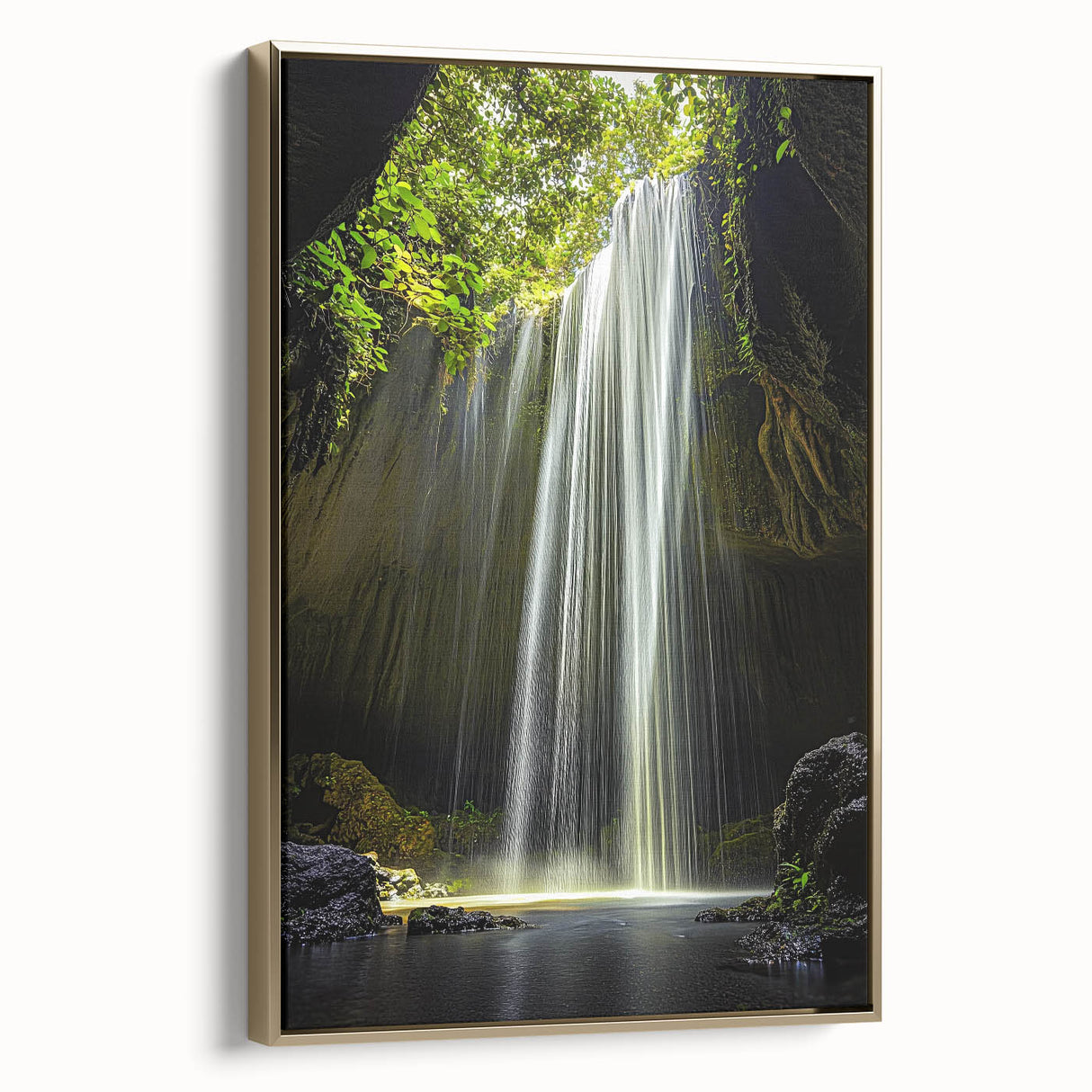 Framed canvas artwork showcasing a stunning landscape of caves with intricate details, highlighted by a luxurious gold frame, perfect for home decor.