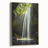 Framed canvas artwork showcasing a stunning landscape of caves with intricate details, highlighted by a luxurious gold frame, perfect for home decor.