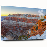 Vibrant acrylic landscape artwork showcasing dramatic cliffs in rich colors, presented in a sleek glass frame, ideal for modern interior decor.