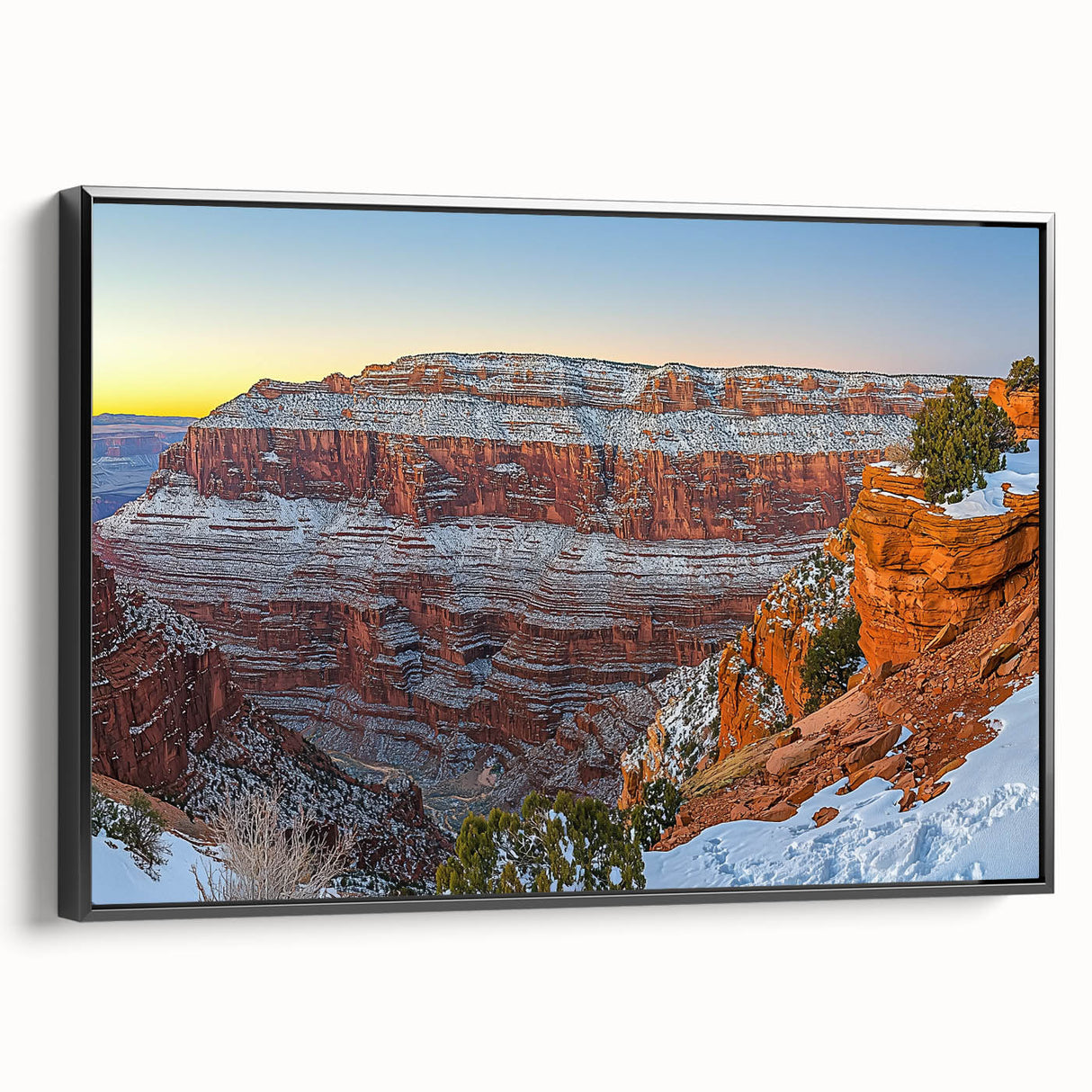Framed canvas artwork showcasing a dramatic cliff landscape, featuring vibrant colors and intricate details, presented in a sleek black frame for modern decor. Perfect for enhancing home or office interiors with natural beauty.