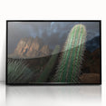 Framed acrylic artwork depicting a dramatic landscape of canyons, showcasing rich earthy tones and intricate details, perfect for modern home decor.