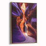 Framed canvas artwork showcasing a vibrant landscape with cave motifs, enhanced by a gold frame, perfect for adding elegance to home decor.