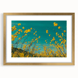 Elegant gold-framed landscape artwork depicting a serene countryside scene with lush greenery and rolling hills, ideal for enhancing home decor.