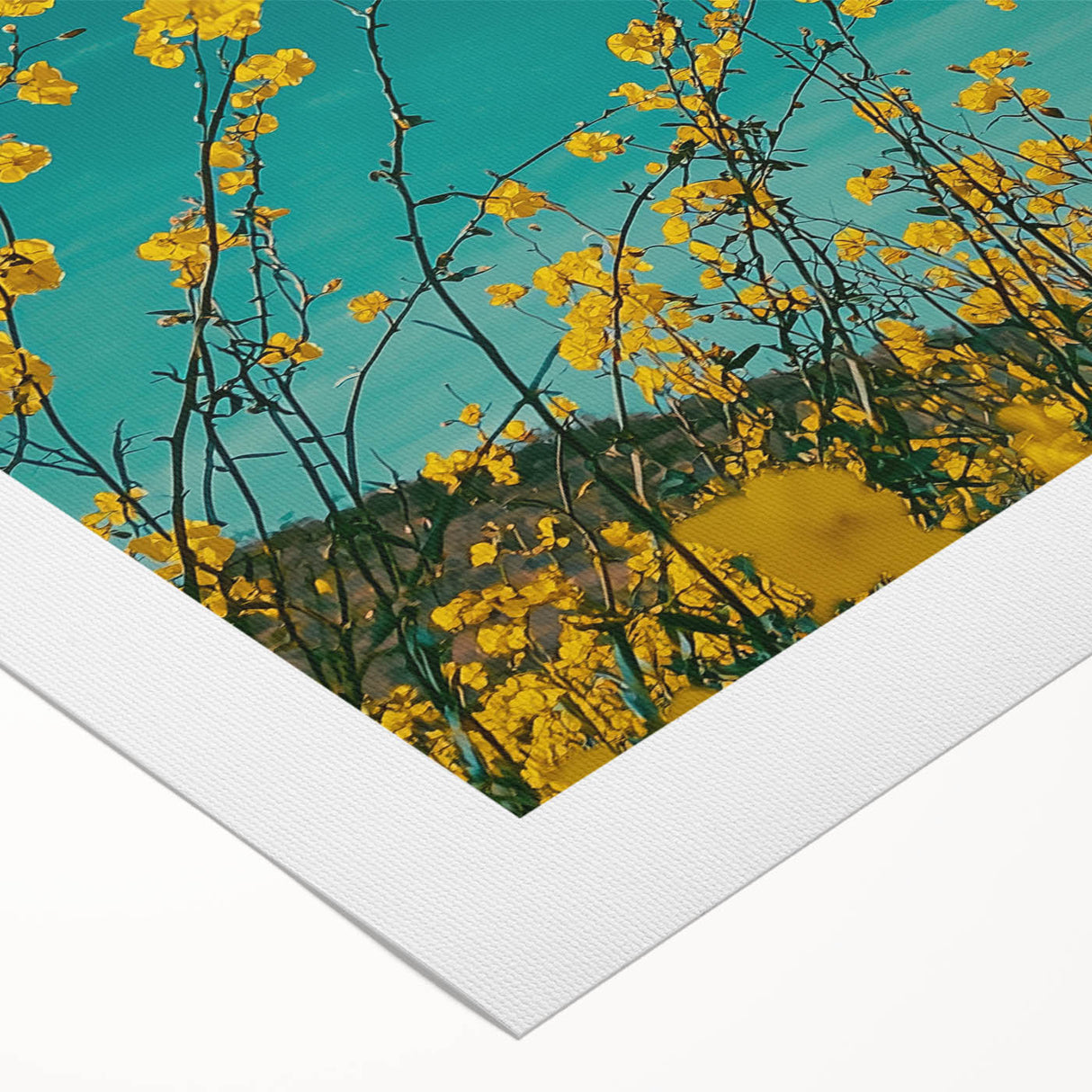 Scenic rolled canvas artwork depicting a serene countryside landscape, showcasing vibrant green fields, rolling hills, and a clear blue sky, ideal for home decor.