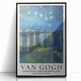Large abstract wall art featuring swirling blue and yellow patterns, acrylic print in black frame.
