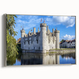 Framed canvas artwork depicting a picturesque landscape with a majestic castle, featuring a silver frame that enhances the scene's elegance and depth. Ideal for home decor.