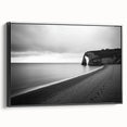 Framed canvas artwork depicting dramatic cliffs and landscapes in vibrant hues, showcasing a black frame. Ideal for enhancing modern decor and nature-themed interiors.