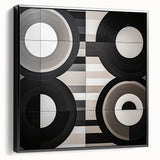 Abstract geometric framed canvas artwork showcasing a modern black design, elegantly displayed from a side view, ideal for contemporary home decor.