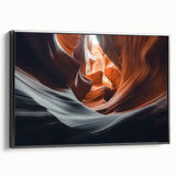 Framed canvas artwork depicting a stunning landscape of canyons in rich earthy tones, showcasing intricate details and textures, with a sleek black frame enhancing its elegance. Perfect for modern home decor or art collectors.