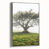 Framed canvas art showcasing a serene countryside landscape with lush greenery and rolling hills, accented by a sleek silver frame, ideal for home decor.