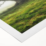 Vibrant rolled canvas artwork depicting a serene countryside landscape, showcasing lush greenery and rolling hills, perfect for home decoration or gifting.
