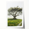 Rolled print showcasing a vibrant countryside landscape with rolling hills, lush greenery, and a serene sky, elegantly packaged in a protective cardboard tube.