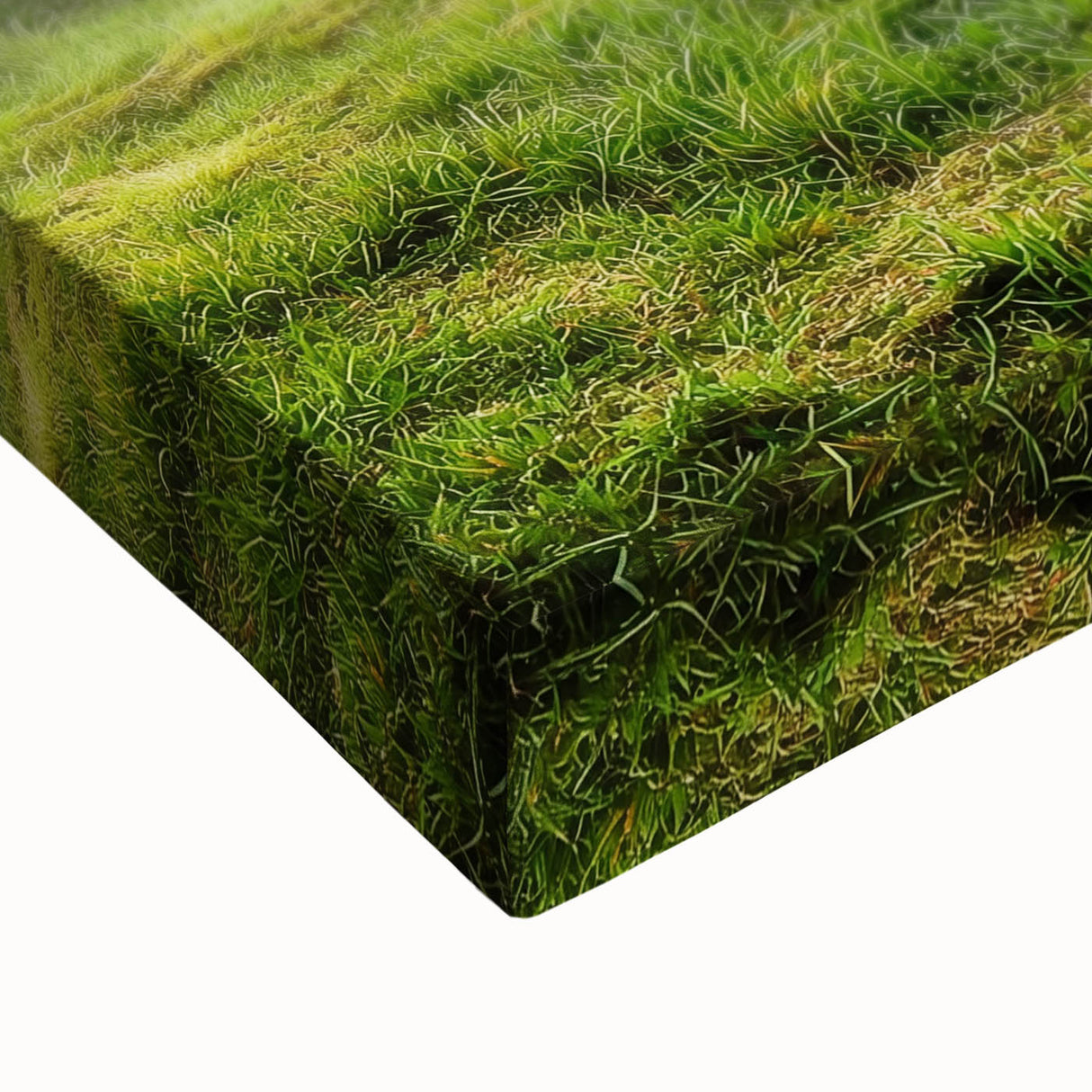 Close-up of a vibrant stretched canvas artwork depicting a serene countryside landscape, featuring lush green fields and a clear blue sky, perfect for home decor.