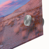 Close-up of a vibrant acrylic landscape design depicting a desert scene, showcasing warm hues of orange and yellow with intricate details, ideal for home decor.