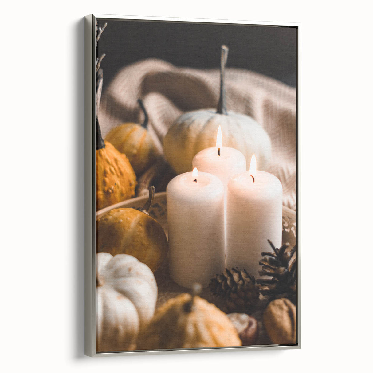 Framed canvas displaying a vintage landscape art painting with colorful autumn trees and a black background.