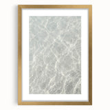 Extra large abstract art print featuring textured swirls in warm orange and gold tones, framed in gold.
