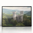 Framed acrylic artwork showcasing a stunning landscape with a majestic castle, featuring a sleek black frame and vibrant colors, perfect for home decor.