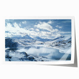 Scenic countryside landscape print on rolled canvas showcasing vibrant green fields and a serene blue sky, elegantly packaged in a protective cardboard tube. Ideal for home decor.