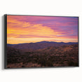 Framed canvas artwork showcasing a stunning desert landscape with vibrant colors and intricate details, featuring a sleek black frame for modern decor.