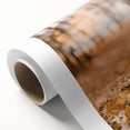 Art deco poster of autumn trees in orange and yellow hues on rolled canvas.