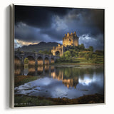 Framed canvas artwork showcasing a stunning landscape with a castle, highlighted by a silver frame, ideal for home decoration or office ambiance.