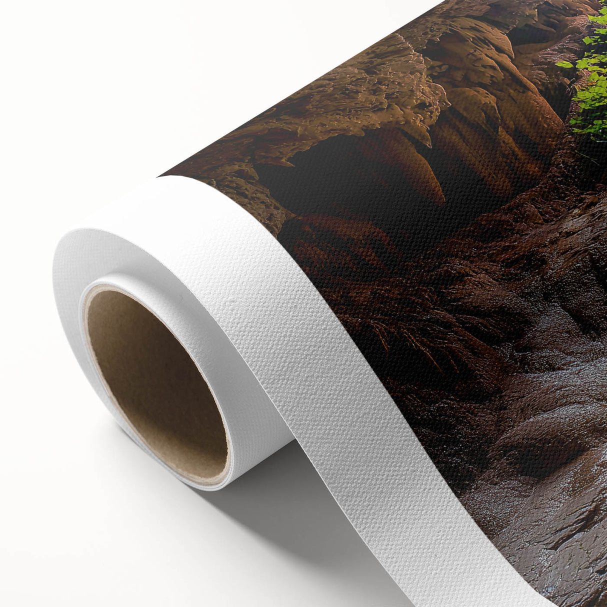 Rolled canvas artwork showcasing a vibrant, abstract landscape design with cave motifs, featuring rich colors and textures, elegantly packaged for delivery.