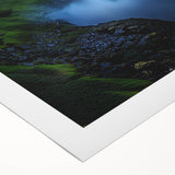 Vibrant rolled canvas artwork depicting a stunning landscape with dramatic cliffs and lush greenery, perfect for home decor, showcasing intricate details and rich colors.