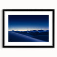 Framed desert landscape artwork in a sleek black frame, featuring warm tones of sand and sky, ideal for enhancing modern home decor. The mat adds a refined touch to the overall presentation, making it a perfect centerpiece for living spaces.