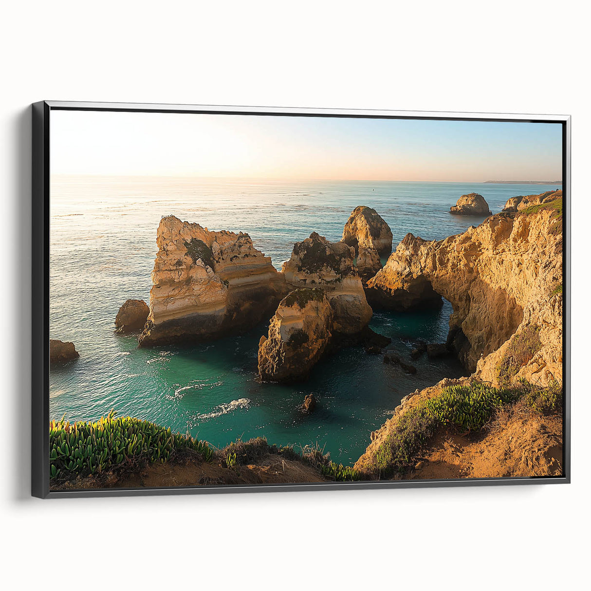 Framed canvas artwork depicting a scenic cliff landscape with vibrant colors, showcasing intricate details and textures, set against a sleek black frame. Perfect for modern home decor.